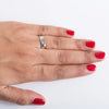 Finger Shot of Single Diamond Platinum Ring for Women JL PT 500. This photo shows how the ring looks on a woman's hand.